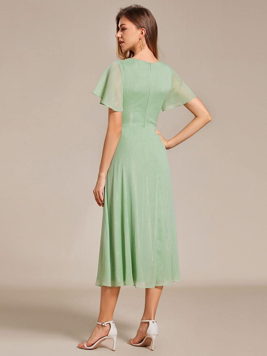 Silver Metallic Fabric V-Neck A-Line Dress featuring Delicate Ruffled Hem #color_Summer Green